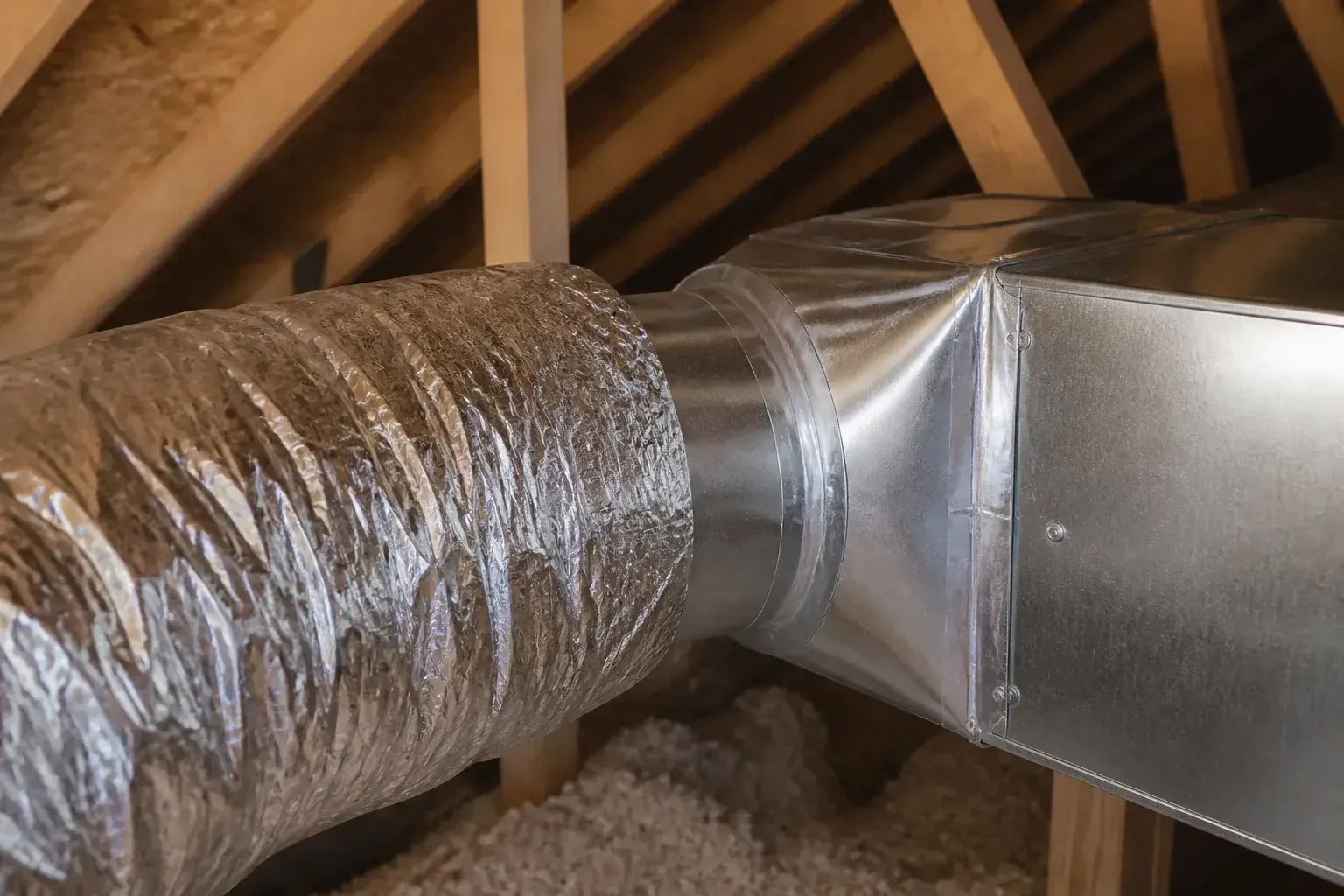 Clean ductwork and sealed connections in an attic